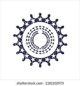 Blue laurel wreath icon inside distressed grunge style stamp