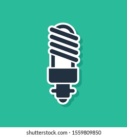 Blue LED light bulb icon isolated on green background. Economical LED illuminated lightbulb. Save energy lamp.  Vector Illustration