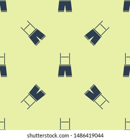 Blue Lederhosen icon isolated seamless pattern on yellow background. Traditional bavarian clothing. Oktoberfest outfit. Pants with suspenders. Patrick day.  Vector Illustration