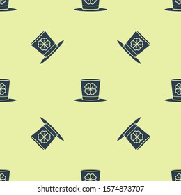 Blue Leprechaun hat and four leaf clover icon isolated seamless pattern on yellow background. Happy Saint Patricks day.  Vector Illustration