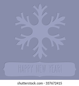 Blue letterpress snowflake and a frame with New Year greetings.