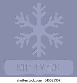 Blue letterpress snowflake and a frame with New Year greetings.