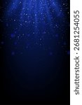 Blue light background. Shiny sparkles falling with glowing rays on dark backdrop. Festive abstract scene for celebration, luxury design, or holiday decoration. Vector illustration.