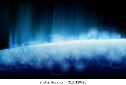 blue light beam with sparkling light reflection from the snow against the dark sky background.