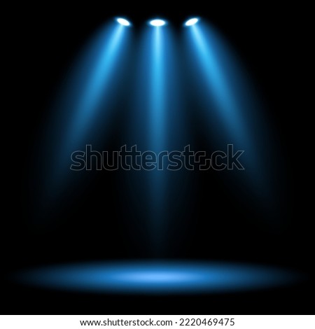 Blue light beams on black background
