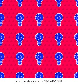 Blue Light bulb with concept of idea icon isolated seamless pattern on red background. Energy and idea symbol. Inspiration concept.  Vector Illustration