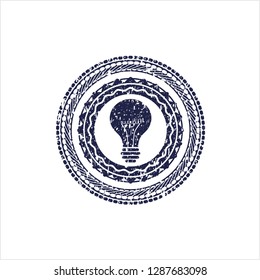 Blue light bulb icon inside rubber seal