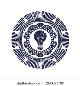 Blue light bulb icon with rubber seal texture