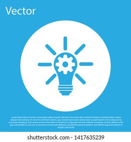 Blue Light bulb with rays shine and gear inside icon isolated on blue background. Innovation concept. White circle button. Vector Illustration