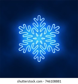 Blue lighting winter sign. Radiating snowflake shaped neon lamp