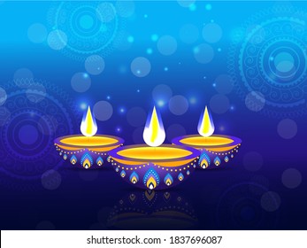 Blue Lights Effect Mandala Pattern Background with Illuminated Oil Lamps (Diya).