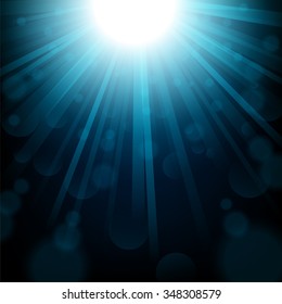 Blue lights shining with sparkles background