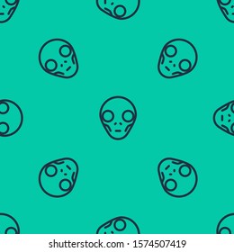 Blue line Alien icon isolated seamless pattern on green background. Extraterrestrial alien face or head symbol.  Vector Illustration