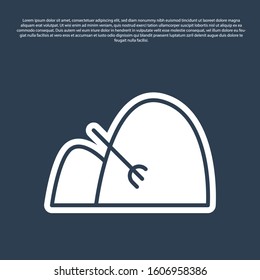 Blue line Bale of hay and rake icon isolated on blue background.  Vector Illustration