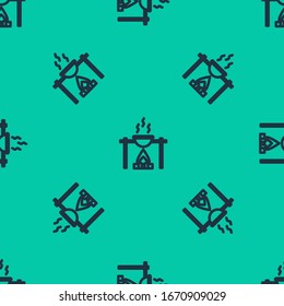 Blue line Campfire and pot icon isolated seamless pattern on green background. Fire camping cooking in cauldron on firewood and flame.  Vector Illustration