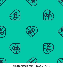 Blue line Candy in heart shaped box and bow icon isolated seamless pattern on green background. Valentines Day.  Vector Illustration