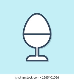 Blue line Chicken egg on a stand icon isolated on blue background.  Vector Illustration