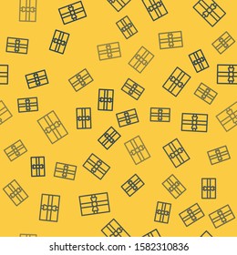 Blue line Gift box icon isolated seamless pattern on yellow background. Merry Christmas and Happy New Year.  Vector Illustration