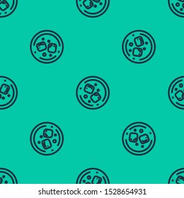 Blue line Glass of whiskey and ice cubes icon isolated seamless pattern on green background.  Vector Illustration