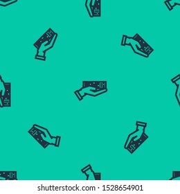 Blue line Hand holding deck of playing cards icon isolated seamless pattern on green background. Casino gambling.  Vector Illustration