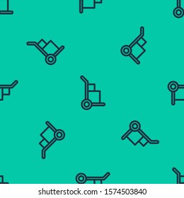 Blue line Hand truck and boxes icon isolated seamless pattern on green background. Dolly symbol.  Vector Illustration