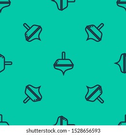Blue line Hanukkah dreidel icon isolated seamless pattern on green background.  Vector Illustration