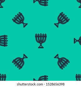 Blue line Hanukkah menorah icon isolated seamless pattern on green background. Hanukkah traditional symbol. Holiday religion, jewish festival of Lights.  Vector Illustration