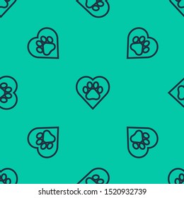 Blue line Heart with animals footprint icon isolated seamless pattern on green background. Pet paw in heart. Love to the animals.  Vector Illustration