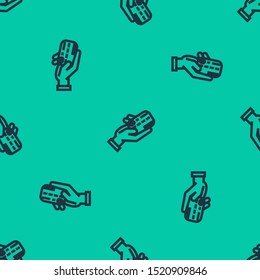 Blue line Human hand holding with credit card icon isolated seamless pattern on green background. Online payment. Pay by card. Financial operations.  Vector Illustration