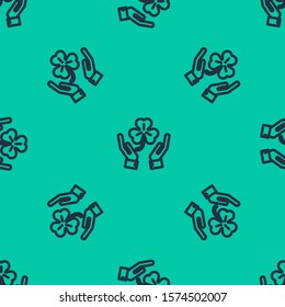 Blue line Human hands holding four leaf clover icon isolated seamless pattern on green background. Happy Saint Patrick day.  Vector Illustration