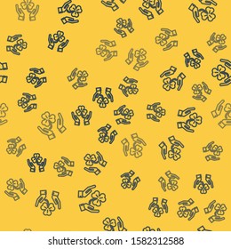 Blue line Human hands holding four leaf clover icon isolated seamless pattern on yellow background. Happy Saint Patrick day.  Vector Illustration