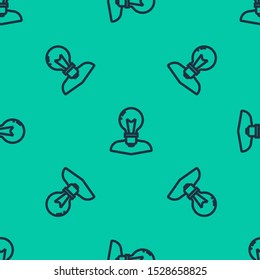 Blue line Human head with lamp bulb icon isolated seamless pattern on green background.  Vector Illustration