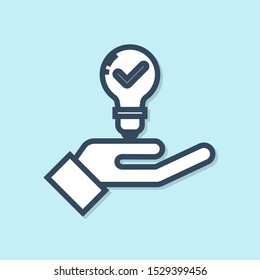 Blue line Light bulb in hand icon isolated on blue background. Concept of idea.  Vector Illustration