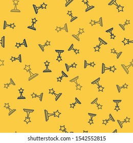 Blue line Movie trophy icon isolated seamless pattern on yellow background. Academy award icon. Films and cinema symbol.  Vector Illustration