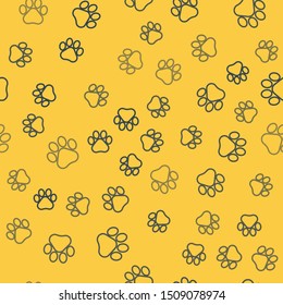 Blue line Paw print icon isolated seamless pattern on yellow background. Dog or cat paw print. Animal track.  Vector Illustration