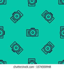 Blue line Photo camera icon isolated seamless pattern on green background. Foto camera icon.  Vector Illustration