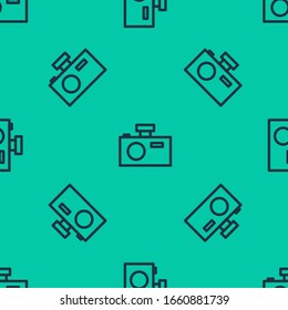 Blue line Photo camera icon isolated seamless pattern on green background. Foto camera icon.  Vector Illustration