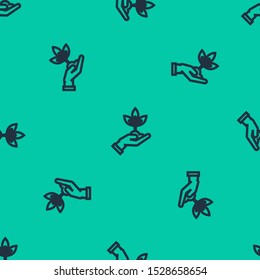 Blue line Plant in hand of environmental protection icon isolated seamless pattern on green background. Seed and seedling. Planting sapling. Ecology concept.  Vector Illustration
