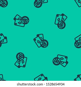 Blue line Playing cards and glass of whiskey with ice cubes icon isolated seamless pattern on green background. Casino gambling.  Vector Illustration