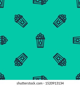 Blue line Popcorn in cardboard box icon isolated seamless pattern on green background. Popcorn bucket box.  Vector Illustration