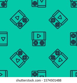 Blue line Portable video game console icon isolated seamless pattern on green background. Gamepad sign. Gaming concept.  Vector Illustration