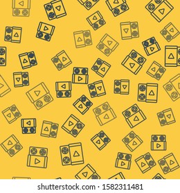 Blue line Portable video game console icon isolated seamless pattern on yellow background. Gamepad sign. Gaming concept.  Vector Illustration