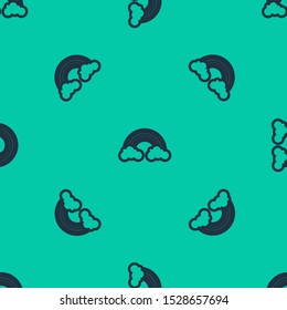 Blue line Rainbow with clouds icon isolated seamless pattern on green background.  Vector Illustration