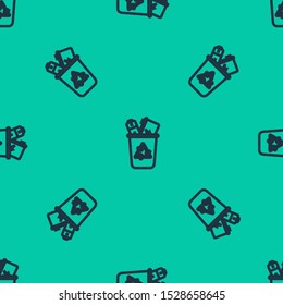 Blue line Recycle bin with recycle symbol icon isolated seamless pattern on green background. Trash can icon. Garbage bin sign. Recycle basket sign.  Vector Illustration