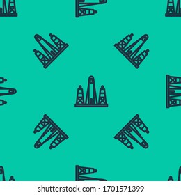 Blue line Rocket launch from the spaceport icon isolated seamless pattern on green background. Launch rocket in space.  Vector Illustration
