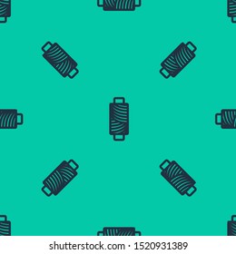 Blue line Sewing thread on spool icon isolated seamless pattern on green background. Yarn spool. Thread bobbin.  Vector Illustration