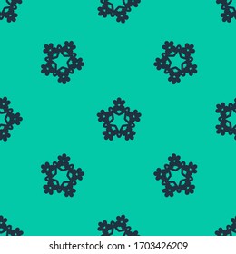 Blue line Snowflake icon isolated seamless pattern on green background. Merry Christmas and Happy New Year.  Vector Illustration
