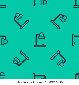 Blue line Table lamp icon isolated seamless pattern on green background. Table office lamp.  Vector Illustration