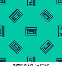 Blue line VHS video cassette tape icon isolated seamless pattern on green background.  Vector Illustration