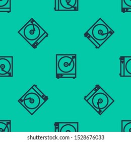 Blue line Vinyl player with a vinyl disk icon isolated seamless pattern on green background.  Vector Illustration